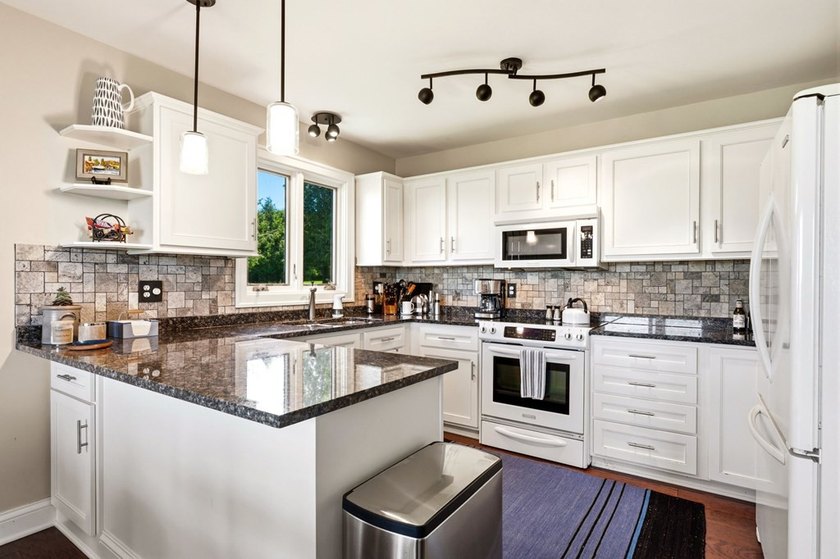 Embrace shorefront living in this beautifully updated - photo 18