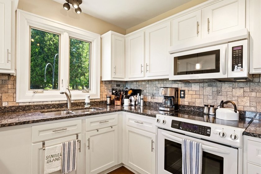 Embrace shorefront living in this beautifully updated - photo 19