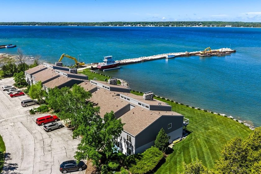 Embrace shorefront living in this beautifully updated - photo 29