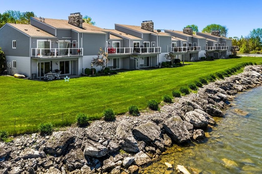 Embrace shorefront living in this beautifully updated - photo 38