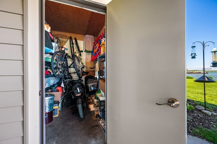 Embrace shorefront living in this beautifully updated - photo 40