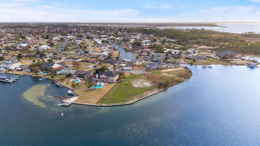 Incredible WATERFRONT OPPORTUNITY offering .76 ACRES of pristine - photo 15