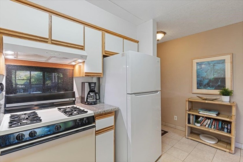 Aloha and welcome to Kihei Akahi C-317! This hotel-zoned - photo 16