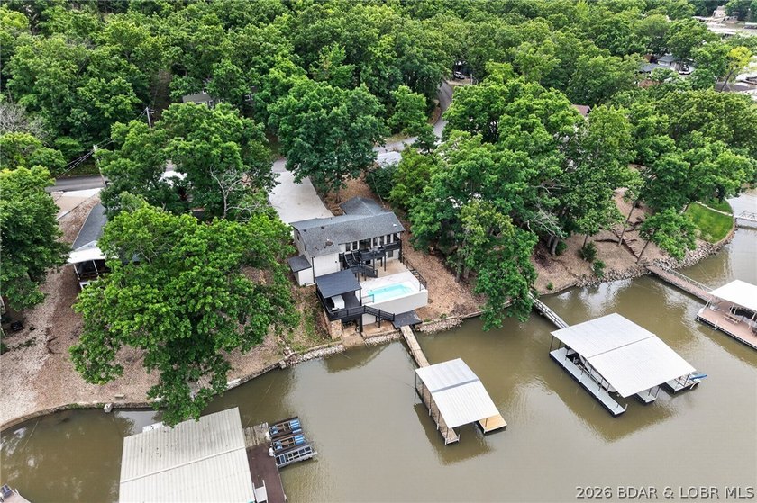 LAKE LIVING AT ITS FINEST! Spectacularly remodeled waterfront - photo 13