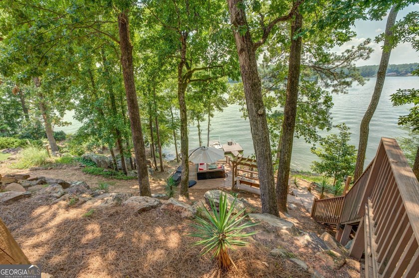 New Price on Custom Elevated Lakefront Home with Carriage House - photo 6