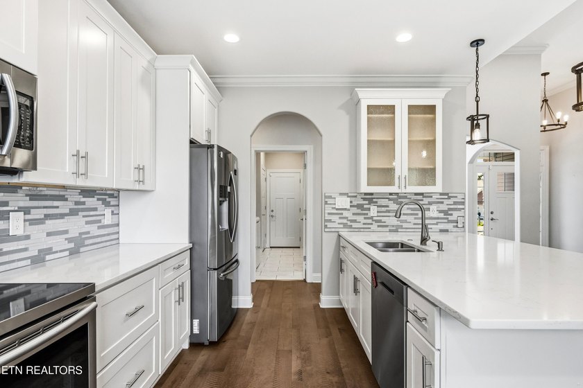 Welcome home to this beautifully crafted custom residence where - photo 11