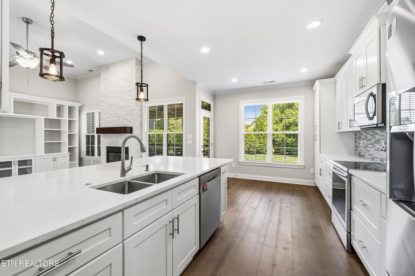Welcome home to this beautifully crafted custom residence where - photo 12