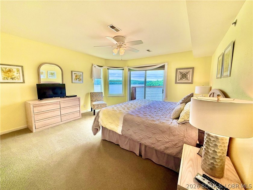 Experience lake life at its finest in this stunning condo - photo 16