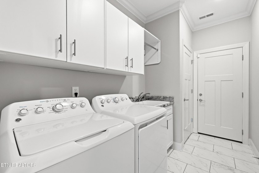 Welcome home to this beautifully crafted custom residence where - photo 26