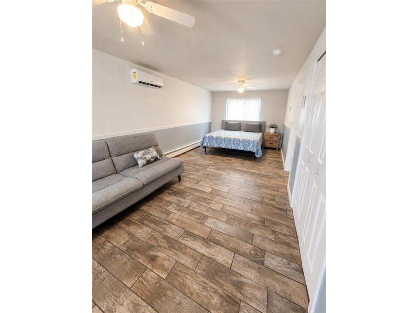 This attractive contemporary raised ranch in popular Eastward - photo 17