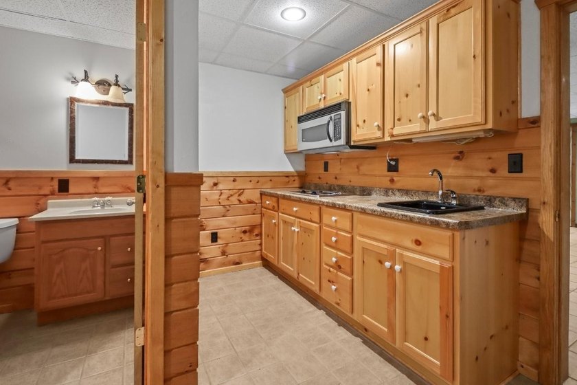 Escape to the ultimate log home sanctuary on nearly 75 pristine - photo 21