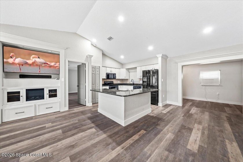 Welcome to a home where comfort meets style. This updated - photo 5