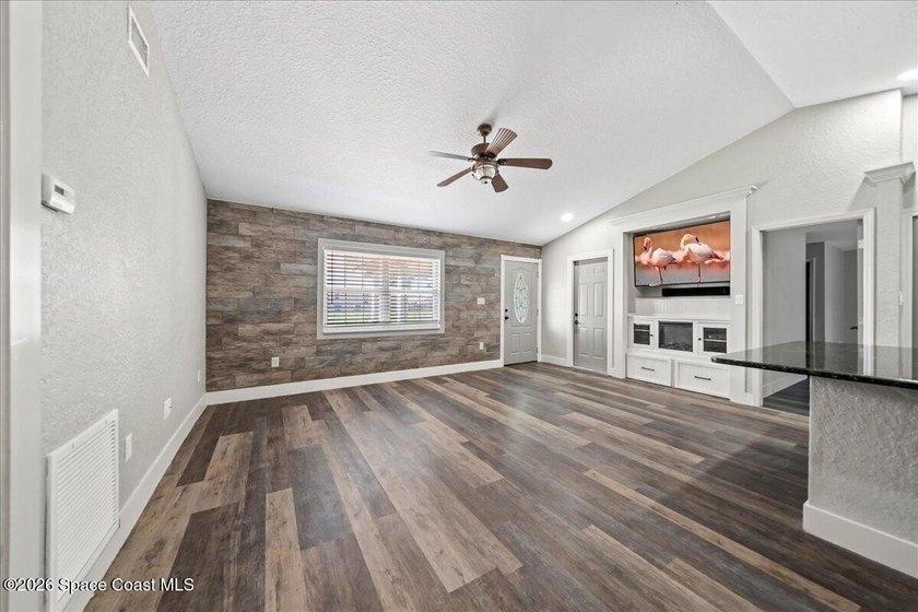 Welcome to a home where comfort meets style. This updated - photo 8