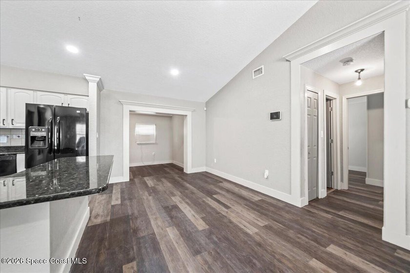 Welcome to a home where comfort meets style. This updated - photo 10
