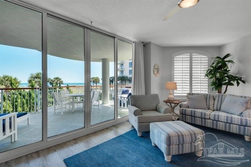This 3br/3ba 1st floor condo has a second level view. It's - photo 3