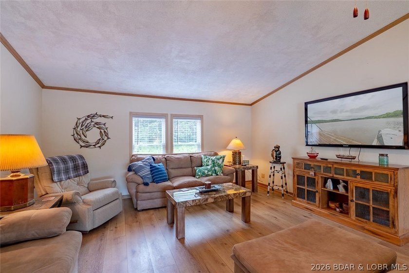 Experience the ultimate Lake of the Ozarks lifestyle with this - photo 11