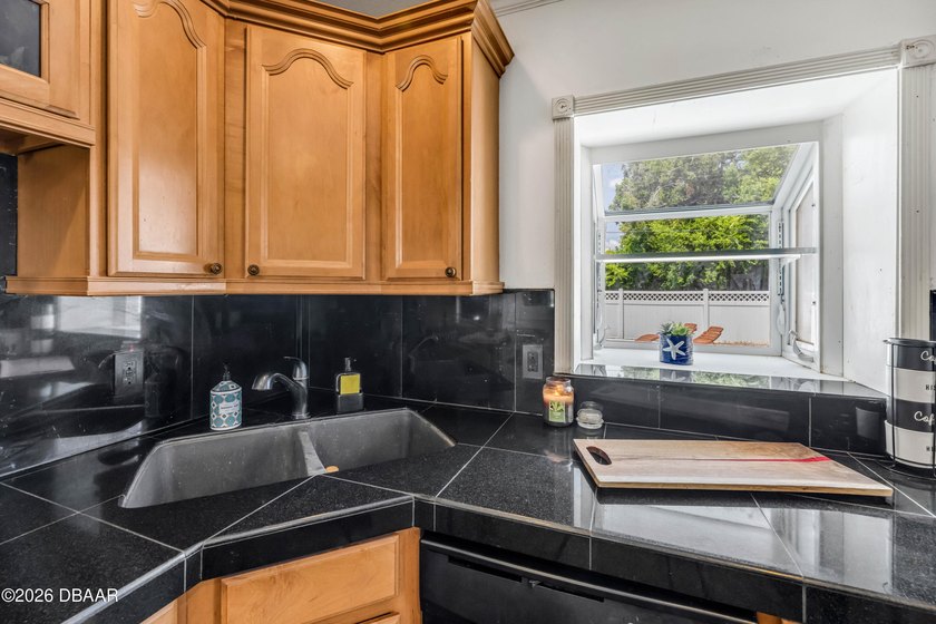 Welcome home to this charming 2-bedroom, 2-bath pool home that's - photo 11