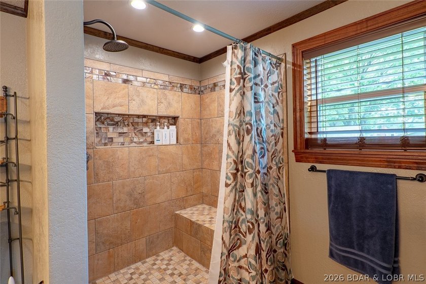 Experience the ultimate Lake of the Ozarks lifestyle with this - photo 17