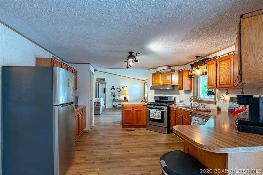 Experience the ultimate Lake of the Ozarks lifestyle with this - photo 26