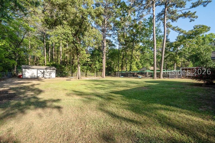 NO HOA! Spacious and inviting 4-bedroom, 2-bath brick home - photo 32