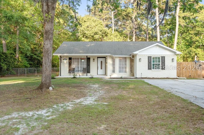 NO HOA! Spacious and inviting 4-bedroom, 2-bath brick home - photo 35