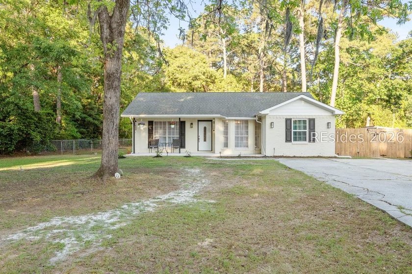 NO HOA! Spacious and inviting 4-bedroom, 2-bath brick home - photo 36