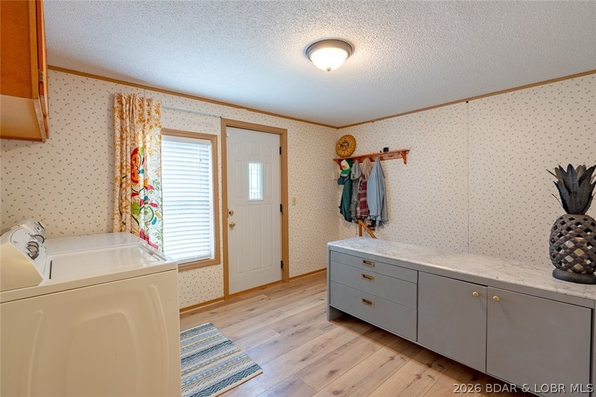 Experience the ultimate Lake of the Ozarks lifestyle with this - photo 43