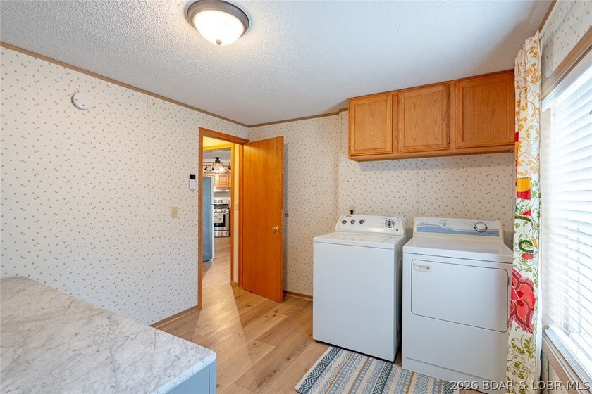 Experience the ultimate Lake of the Ozarks lifestyle with this - photo 45