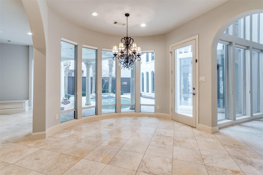 Stunning Mediterranean style home featuring 5 bedrooms, 3 living - photo 11