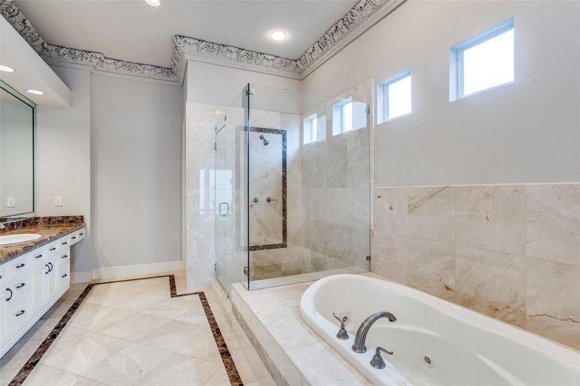 Stunning Mediterranean style home featuring 5 bedrooms, 3 living - photo 16
