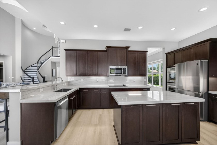 Experience the best of South Florida living in the highly sought - photo 18