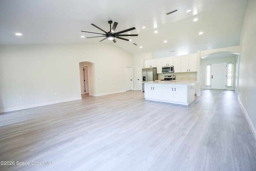 MotiOpen, airy, and move-in ready--with a flexible layout and - photo 9