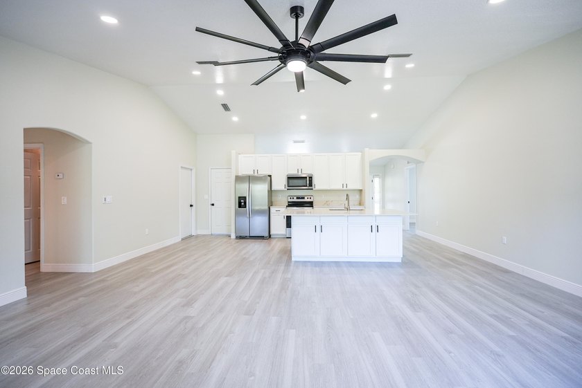 MotiOpen, airy, and move-in ready--with a flexible layout and - photo 10