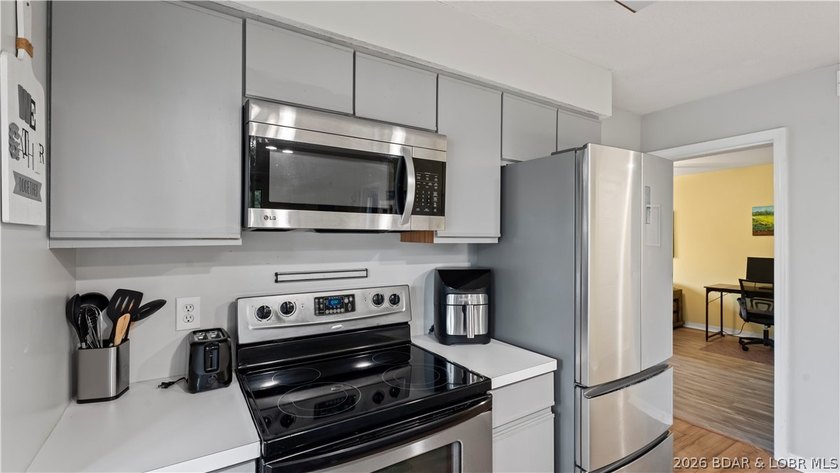 Welcome home to the Osage Vista's community. This top floor unit - photo 11