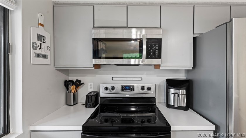 Welcome home to the Osage Vista's community. This top floor unit - photo 12