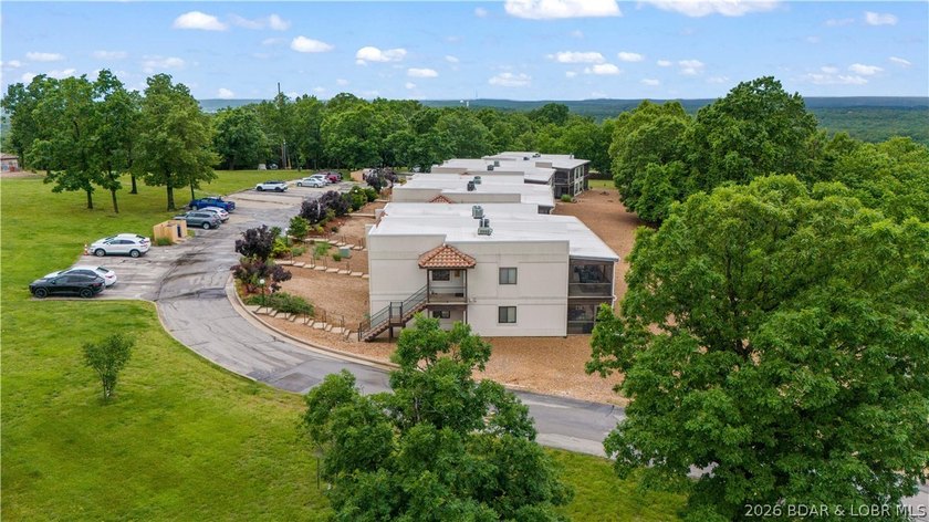 Welcome home to the Osage Vista's community. This top floor unit - photo 39