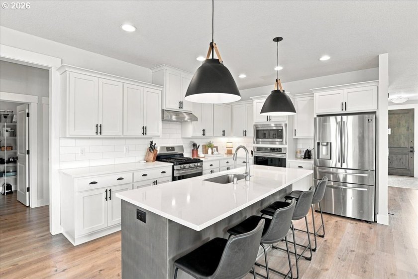 Welcome to exceptional living in the highly sought-after gated - photo 2