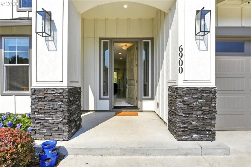 Welcome to exceptional living in the highly sought-after gated - photo 3