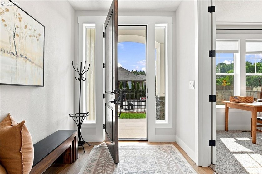 Welcome to exceptional living in the highly sought-after gated - photo 4