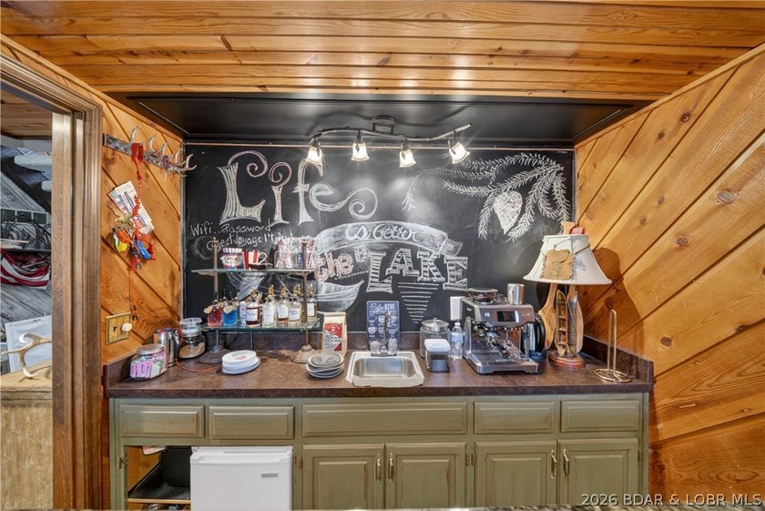 Discover a rare opportunity to own a truly distinctive lakefront - photo 11