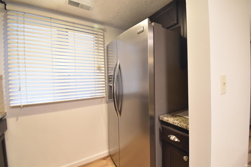 Highly desirable end-unit condo in Waters Edge II at The Pointe - photo 12