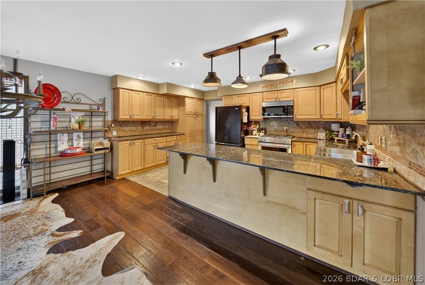 Discover a rare opportunity to own a truly distinctive lakefront - photo 15