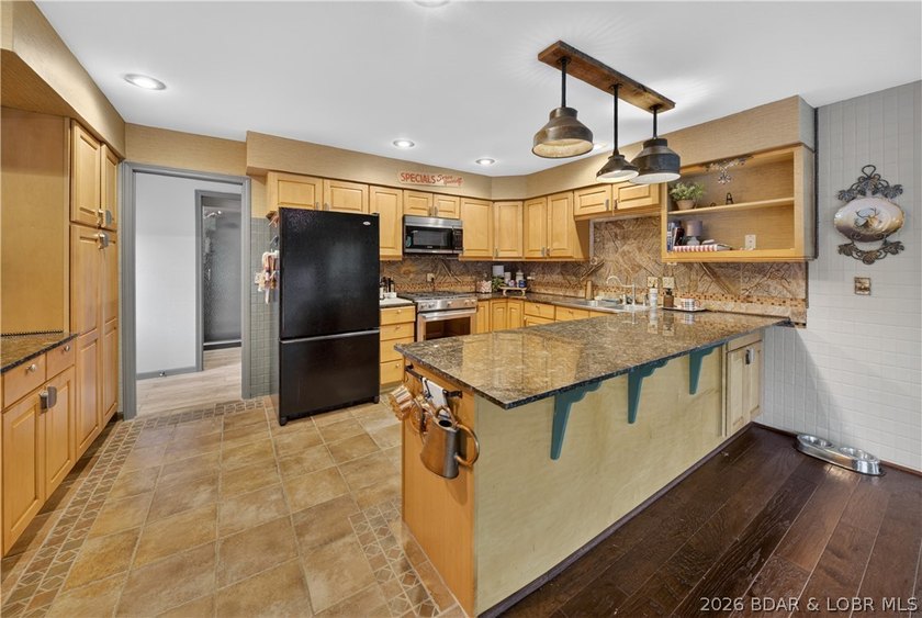 Discover a rare opportunity to own a truly distinctive lakefront - photo 16
