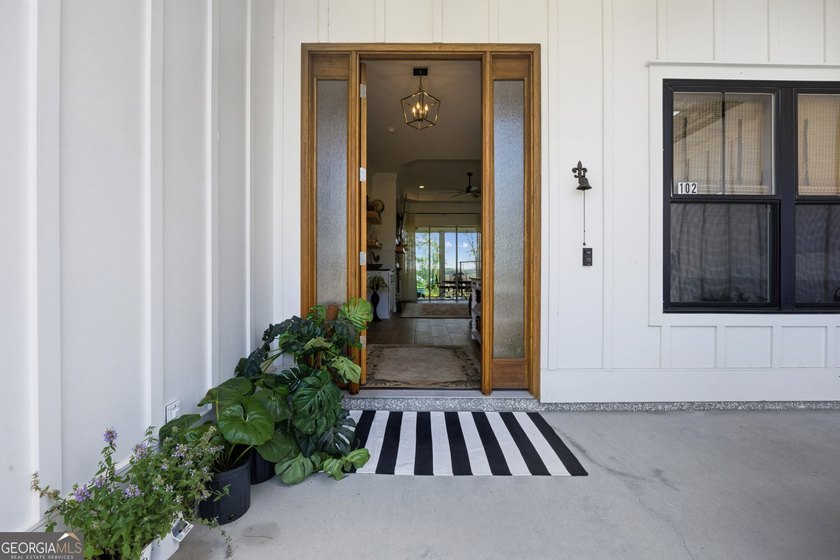 SHOWING LIKE A MODEL HOME, this exceptional custom-built - photo 8
