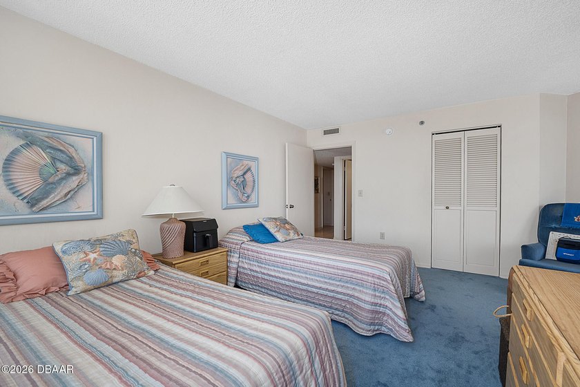 This spacious residence features a true two-bedroom - photo 18