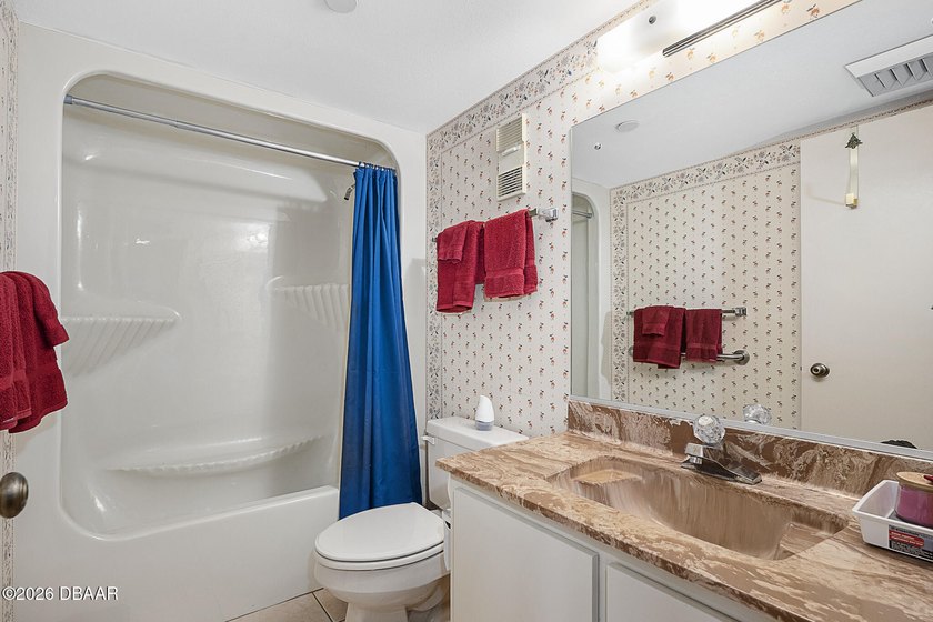 This spacious residence features a true two-bedroom - photo 20
