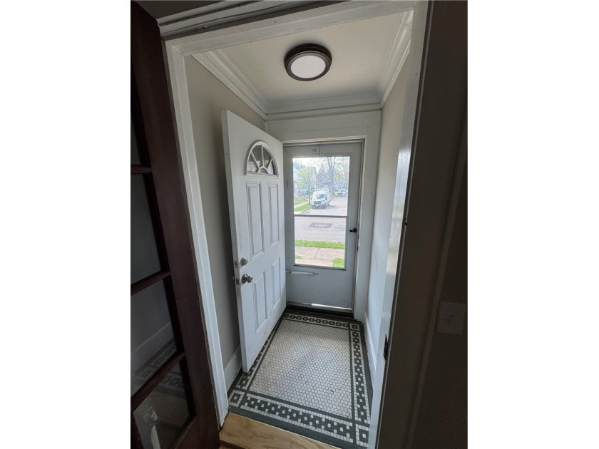 Check out this side-by-side duplex in North Winton Village! With - photo 2
