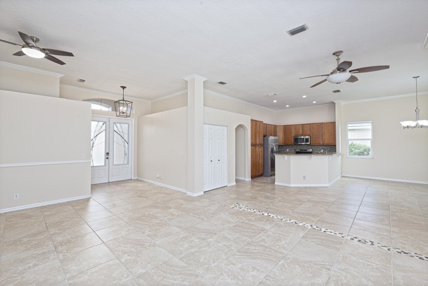 Beautifully remodeled 3BR/2BA heated saltwater pool home in - photo 12