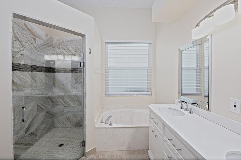 Beautifully remodeled 3BR/2BA heated saltwater pool home in - photo 27