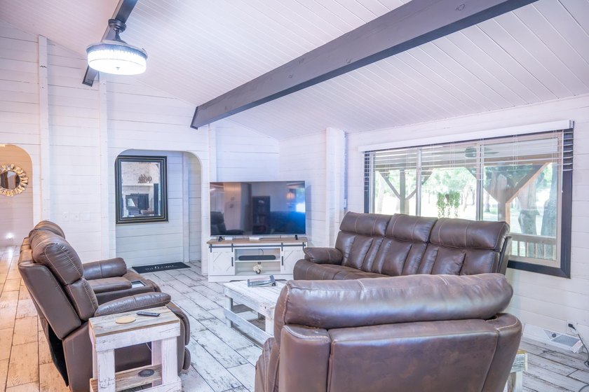 Enjoy 100 feet of owned frontage on Castle Rock Lake with this - photo 13